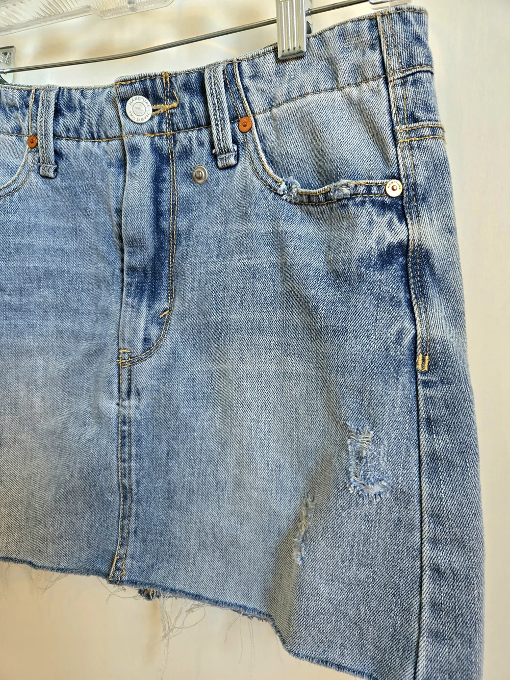 Habitual Studded Raw Hem Light Wash Denim Mini Skirt